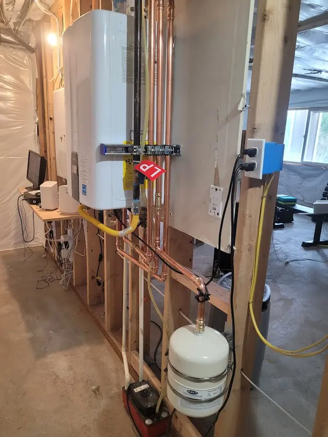 Licensed plumber repairing a kitchen sink in Princeton